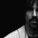 Anthony Kiedis with a moustache black & white portrait with part of his face