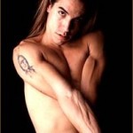 Anthony Kiedis topless with arms crossed