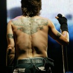 Anthony Kiedis topless rear view of back tattoo eagle falcon