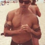 Anthony Kiedis topless on beach
