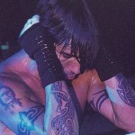 Anthony Kiedis tattoo arm bands and celtic dagger tattoos