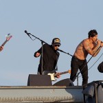 bare chested anthony Kiedis singing on rooftop with RHCP in Muscle Beach California
