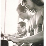 Anthony Kiedis black & white photo from Kerrang legends with RHCP Flea and Frusicante playing the piano