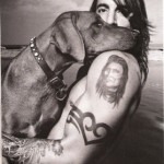 Anthony Kiedis black & white photo of him and a dog