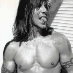 topless Anthony Kiedis sticking out tongue