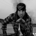 Anthony Kiedis black & white photo of him looking mean wearing a head scarf