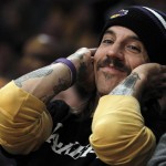 Beautiful Anthony Kiedis Lakers game LA holding head