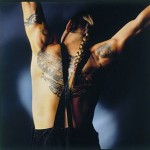 Anthony Kiedis with ponytail back tattoo of tribal motif