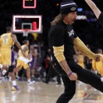 Anthony Kiedis Lakers game LA kicking on court