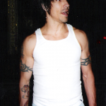 Photo taken by Blackie Dammett of Anthony Kiedis wearing a white vest t-shirt